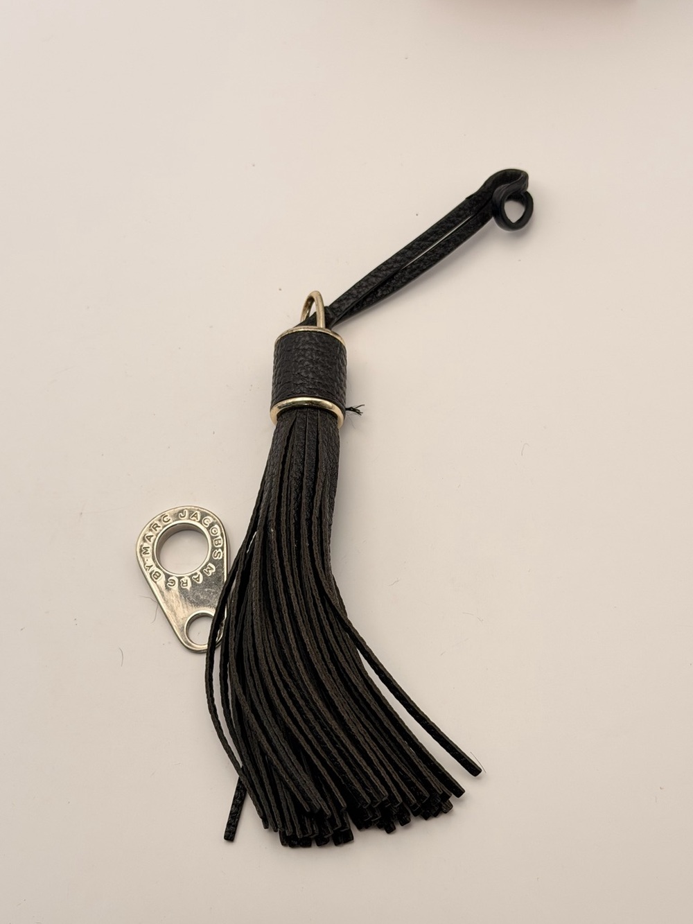 Marc Jacob’s Tassel and Zipper Pull, very good, black